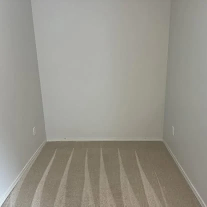 Freshly cleaned empty carpeted room